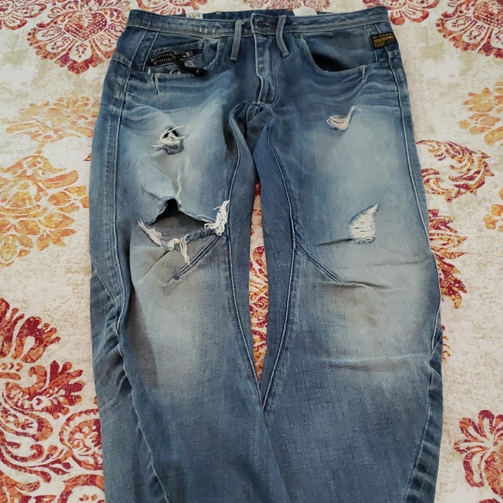 A pair of GStar blue jeans
